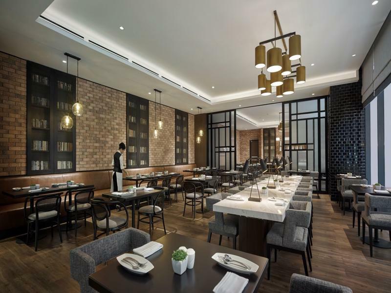 Hotel Stripes Kuala Lumpur, Autograph Collection Exterior photo The interior of the restaurant